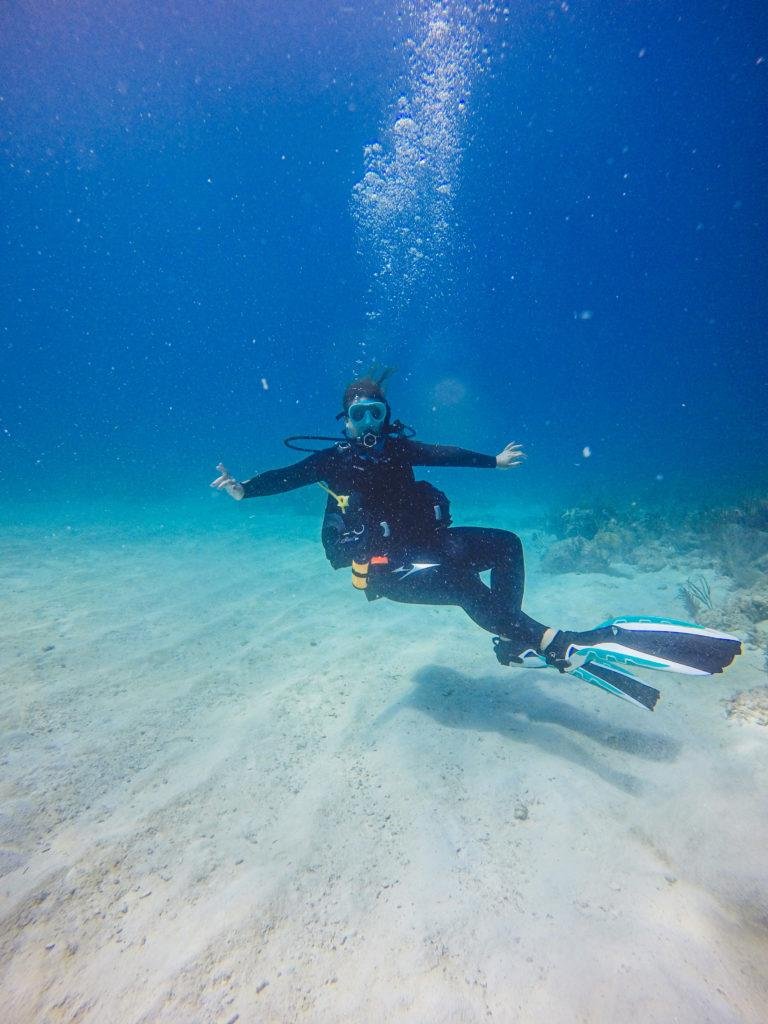 scuba diver in the ocean floor