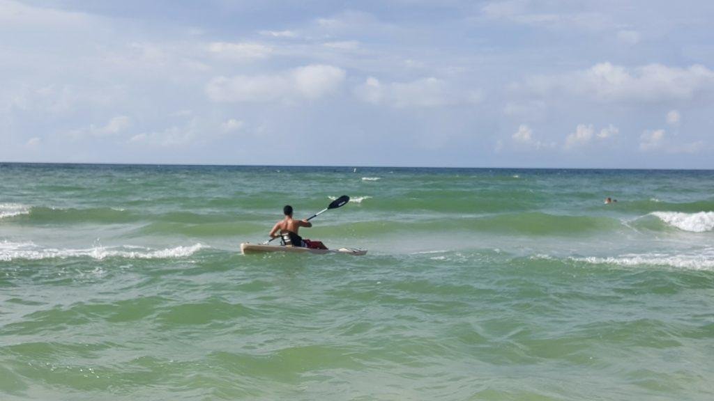 man kayaking in sanibel island florida 