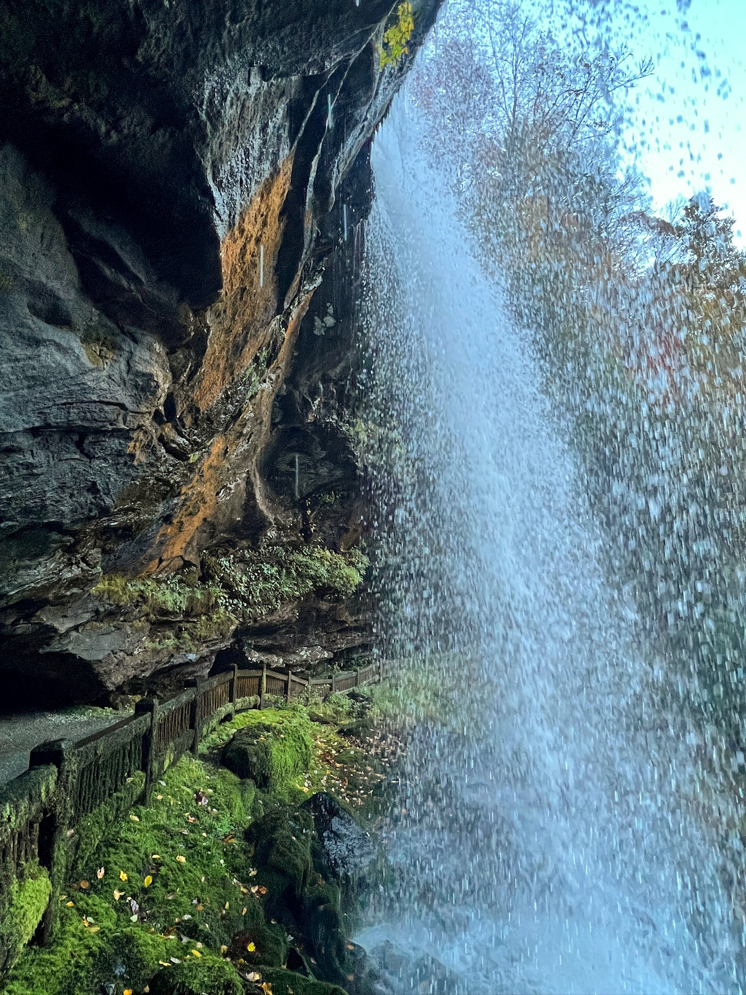 walking behind a waterfall in north carolina