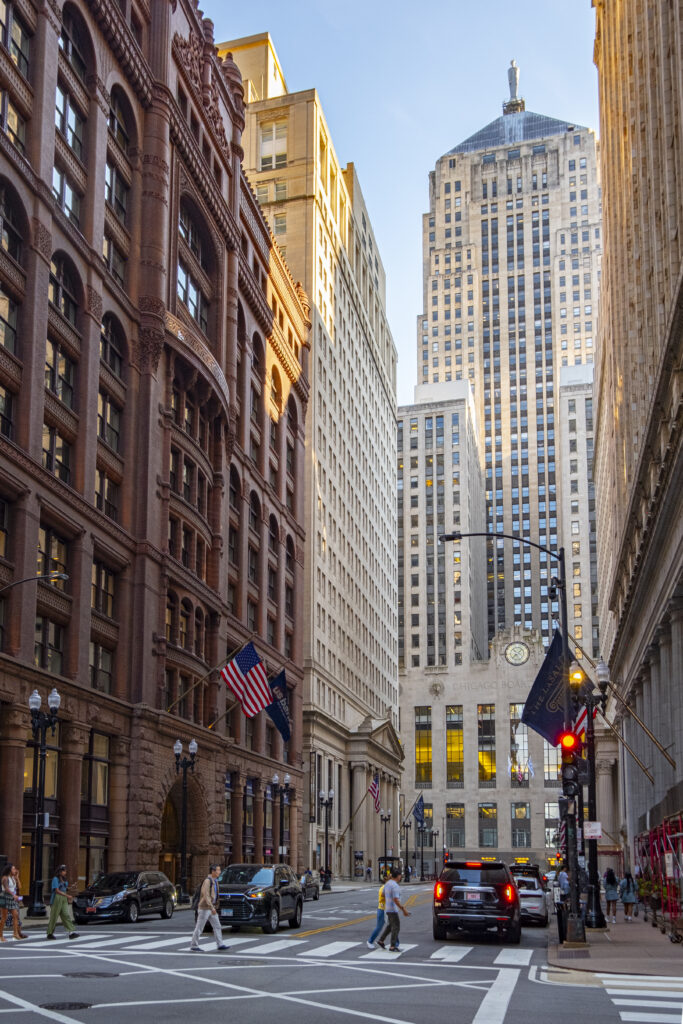 Iconic view of Chicago's majestic architecture at S La Salle St with the Chicago Board of Trade Building in the background
