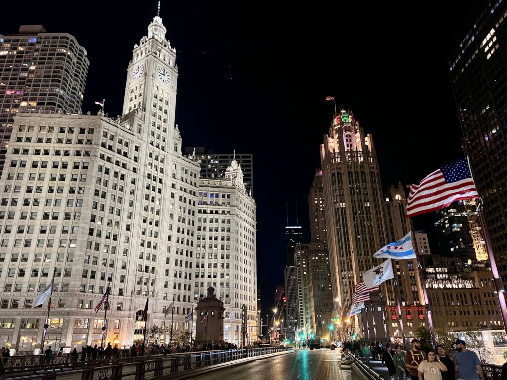 Night views from the DuSable Bridge in Chicago with The Wrigley Building on the right