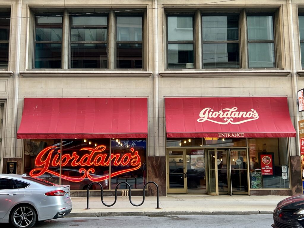 storefront of Giordano's on W Jackson Blvd in Downtown Chicago