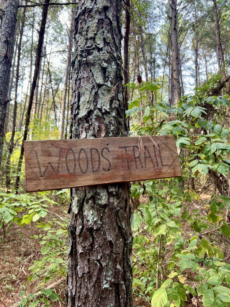 woods trail sign in The Rock Garden