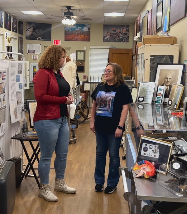 Yanitza of Next Stop Adventures interviewing Jessica Whitehead, museum director and author, inside the Central State Hospital Museum in Milledgeville, Georgia.