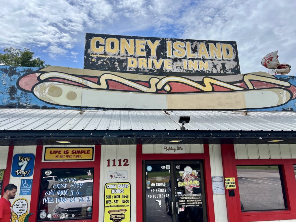 Exterior of Coney Island Drive Inn in Brooksville, Florida, a classic American drive-in restaurant that feels like stepping into another decade.
