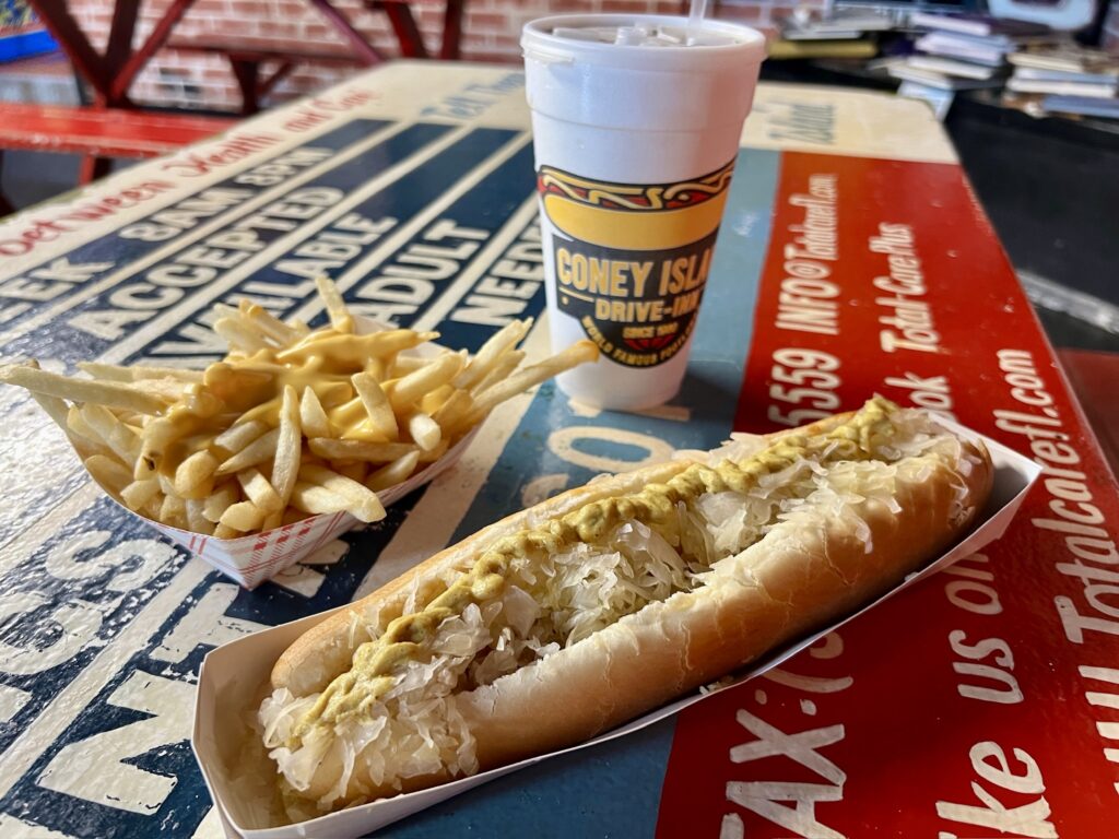 Famous hot dog from Coney Island Drive Inn in Brooksville, Florida, a must-stop for classic American drive-in food on any Old Florida road trip.