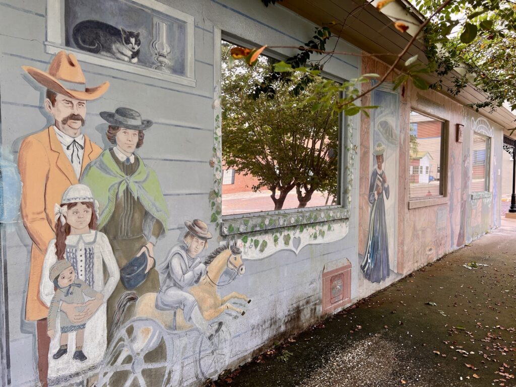 Colorful street murals in downtown Brooksville, Florida, part of the town's self-guided mural and arts tour through the historic district.